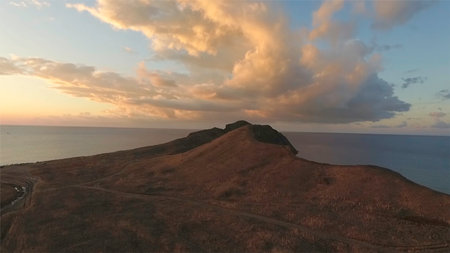 Beautiful rock at sunset aerial view. Shot. Large rock near the seaの写真素材