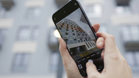 4k video shooting phone screen. Action. Professional shooting quality on modern phone. New phone shoots with 4k resolution and different distance modesの写真素材