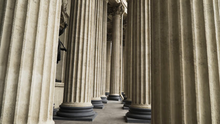 Corinthian columns of Kazan Cathedral, Saint-Petersburg, Russia. Action. Bottom view of the beautiful colonnade of Russian Orthodox Church, concept of architecture.の写真素材