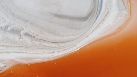 Aerial view of beautiful Red Lagoon Red Lake and salt islands. Shot. Eduardo Avaroa andean fauna National Reserve, Boliviaの写真素材