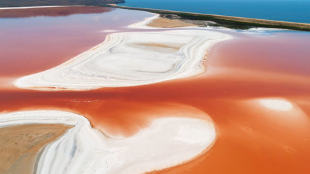 Aerial view of beautiful Red Lagoon Red Lake and salt islands. Shot. Eduardo Avaroa andean fauna National Reserve, Boliviaの写真素材