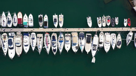 Top view of boats in Procida, Italy, the most popular tourist attractions on the beach. Action. Yacht parking, yacht and sailboat is moored at the quayの写真素材