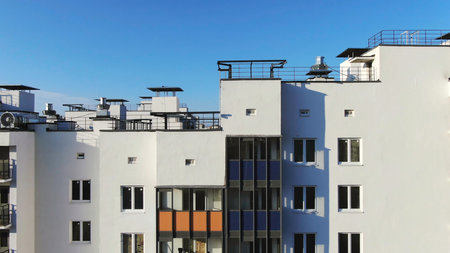 Close-up view facade of the beautiful colorful of a tall residential building. Motion. High-rise buildings modern architecture skyline.の写真素材