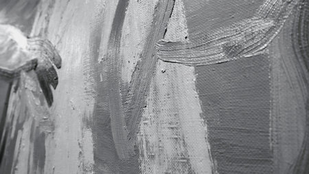 Close-up of monochrome oil paintings with bold strokes in the museum or gallery of modern art. Concept. Modern exhibitionの写真素材