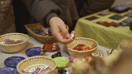Ceramic figurines depicting peasants and townspeople. Figurines of a landowner with a horse and a woman in a dress. Figurines made of faience and clay, covered with glaze, depicting ladies, gentlemen and horsesの写真素材