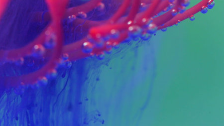 A bright flower in abstraction. A bright background on which a flower is lowered into the water and...