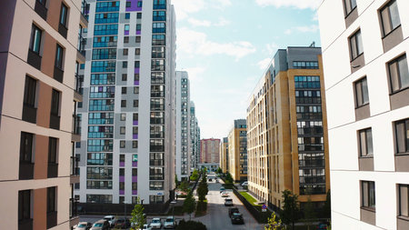 Top view of modern residential buildings in new area. Stock footage. New multi-storey buildings in...