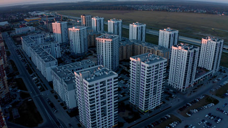 Aerial view of a beautiful city with high rise buildings and greenery. Stock footage. Concept of...