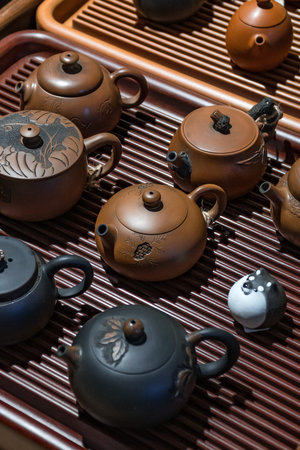 A Beautiful Collection of Assorted Teapots Displayed Elegantly on a Decorative Rack