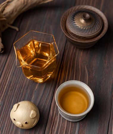 Enjoy a Cozy Tea Setup with Unique Accessories and Elegant Glassware for enhanced enjoymentの写真素材