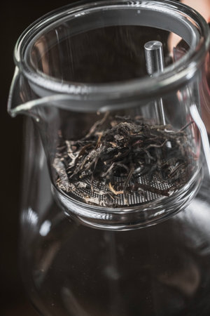 Enjoy the delightful experience of Loose Leaf Tea beautifully infused in a lovely Glass Teapotの写真素材