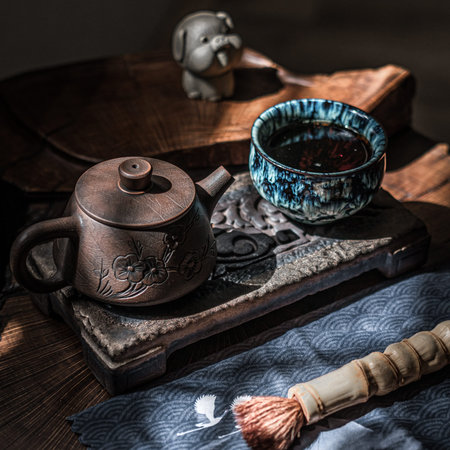 Enjoy a serene Tea Ceremony with a beautiful teapot and cup set for a delightful experience