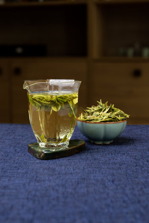 A delightful and refreshing Herbal Tea with a beautiful presentation of loose leaves awaits youの写真素材
