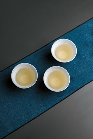 An Elegant Tea Ceremony Featuring Beautifully Designed Minimalist Cups for Enjoymentの写真素材