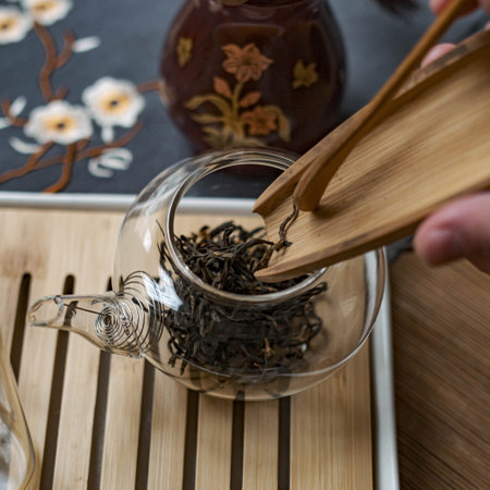 Experience the elegant art of tea brewing with bamboo tools and highquality loose leaf teaの写真素材
