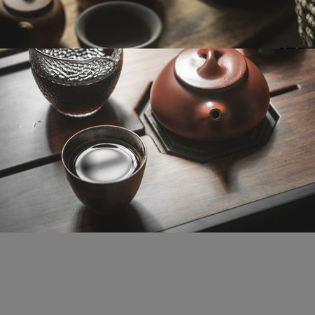An Elegant Tea Ceremony Setup Featuring Traditional Utensils and Beautiful Artistryの写真素材