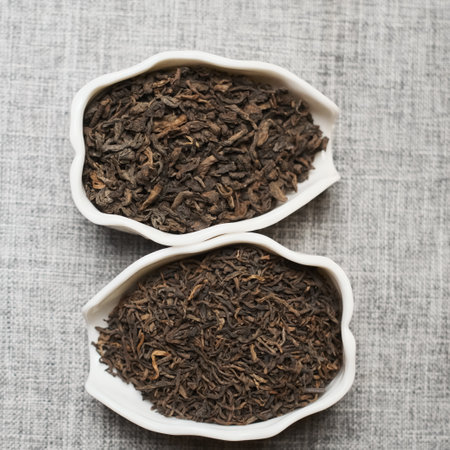 Discover the various kinds of loose leaf tea presented beautifully in elegant bowlsの写真素材
