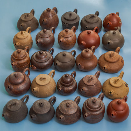 A Beautiful Collection of Unique Teapots Showcasing a Variety of Colors and Texturesの写真素材