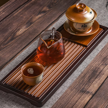 A Traditional Tea Ceremony Setup Featuring a Teapot and a Beautiful Cup for Enjoyment