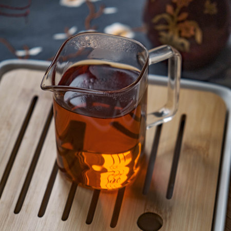 Enjoy the Warm Brewed Tea in a Teapot A Serene Aroma Experience for Relaxation and Comfortの写真素材