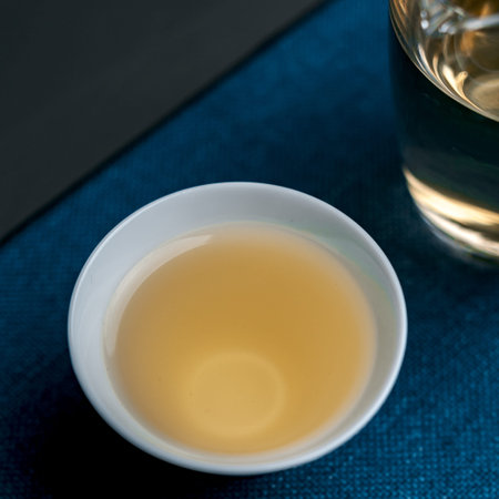 A Serene and Inviting Cup of Tea Placed on a Beautifully Textured Surface to Enjoy