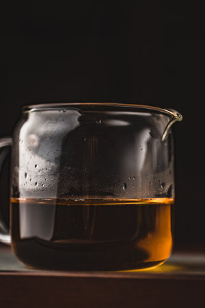 A CloseUp View of an Aromatic Brew Carefully Poured into a Glass Beaker for Enjoymentの写真素材