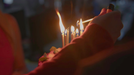 Celebrating Life with a Beautiful Birthday Cake Adorned with Colorful Candles and Joyful Moments....