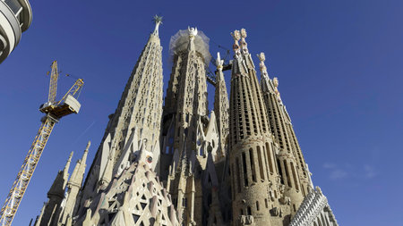 Sagrada familia showing ongoing construction works in barcelona. Actionの写真素材