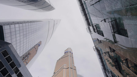 A stunning skyscraper stands tall among the vast and diverse urban architecture of the city.