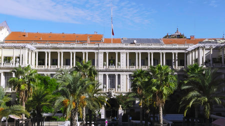 French flag waving on prefecture building in nice, France. Actionの写真素材