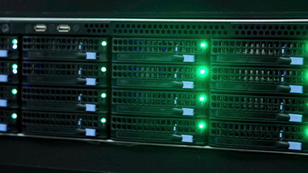 Server rack blinking green lights in data center. Media