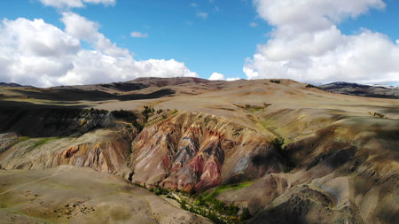 Colorful canyon landscape with clouds moving in the sky.