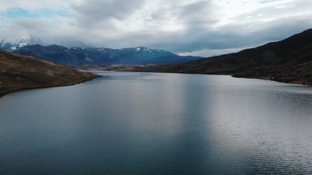 Aerial view of patagonia lake and andes mountains. Mediaの写真素材