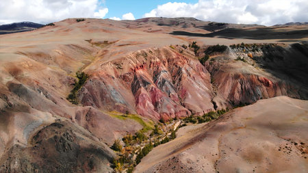 Kyzyl-Chin valley showing colorful clay mountains in Altai Republic.