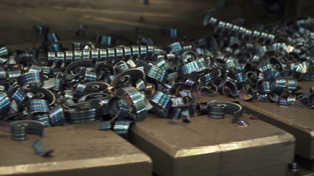 Metal shavings accumulating during industrial process. Stock clip