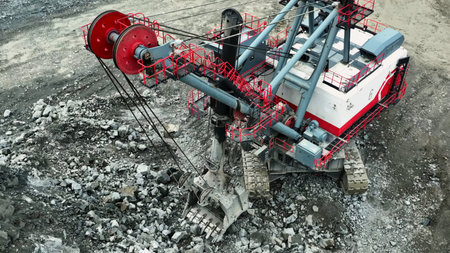 Giant excavator gathering rocks in a quarry. Stock clip