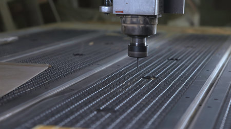 Showing Detailed Woodworking Process With CNC Router Carving Intricate Grooves Into Wood Piece....