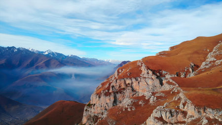 Aerial view of mountain landscape with moving clouds. Mediaの写真素材