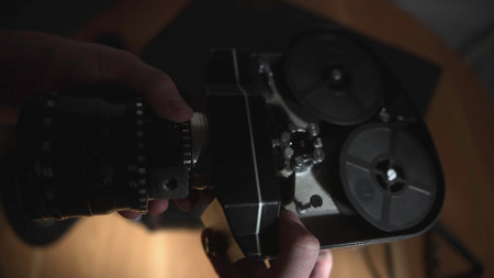 Old Camera With Grainy Textures. Authentic Cinematic Process Captured In Dim Studio Lighting . Media