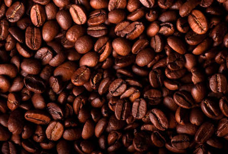 Grains of black coffee on an equal surfaceの写真素材