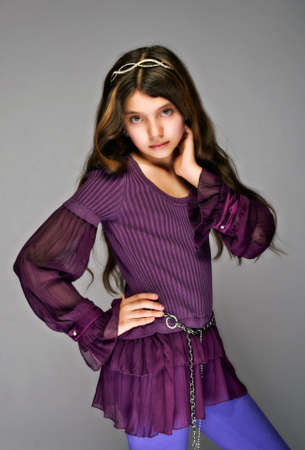 Young, beautiful girl with long, flowing hair with tiaraの写真素材