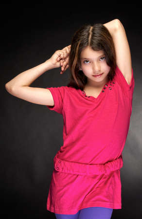 The beautiful, young girl  in a red dressの写真素材