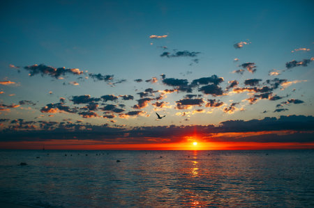Landscape of amazing sunrise over the sea with dramatic sky clouds. Sunrise shot on the beach,...
