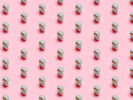 Valentine background, Girls theme, Isometric pattern photographed, cute Russian Matryoshka dolls on a light pink background, wrapping paper, postcard, wallpaperの写真素材