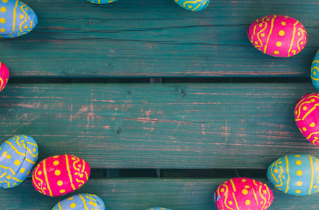 Easter bowl, chocolate eggs, green bench, Easter background