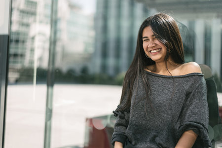 happy young woman portrait close up smiling with sunglasses