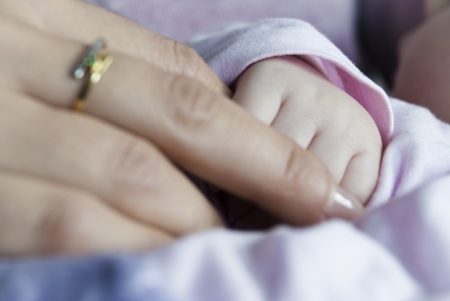 Mother and daughter handsの写真素材