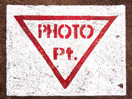 Photo point sign on the groundの写真素材