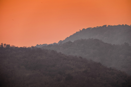 Red sky behind the moutainの写真素材