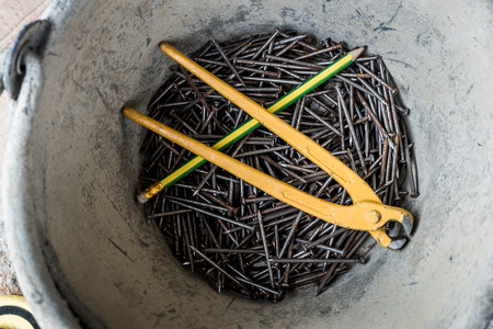 Tack pliers and pencilの写真素材